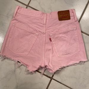 Pink Levi’s 501 high rise cut off jean shorts size 25